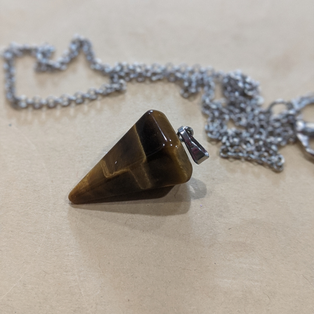 🏷️ Natural Stone Crystal Pendulum - brown